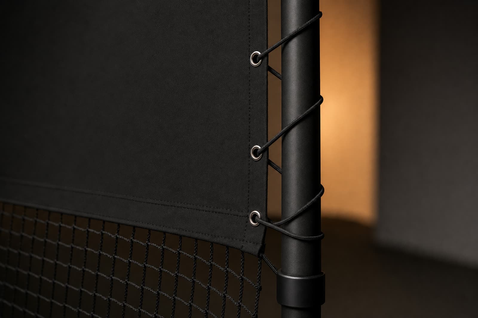 Concept render close-up of brass-set grommets and shock-cord lacing attaching the side panel to the upright